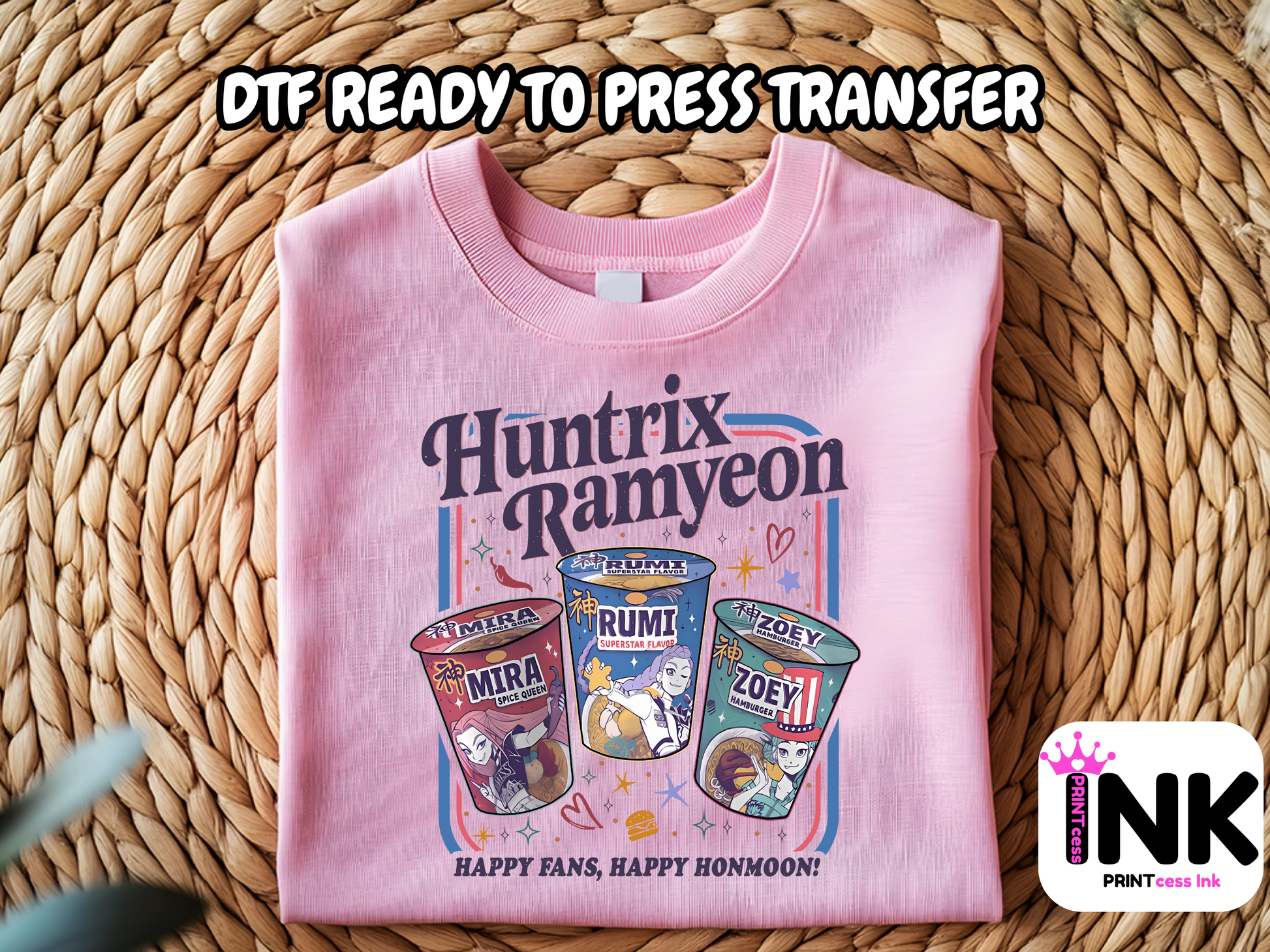 Pink sweatshirt with 'Huntrix Rameyeon' design on a woven surface, featuring DTF ready to press transfer text.
